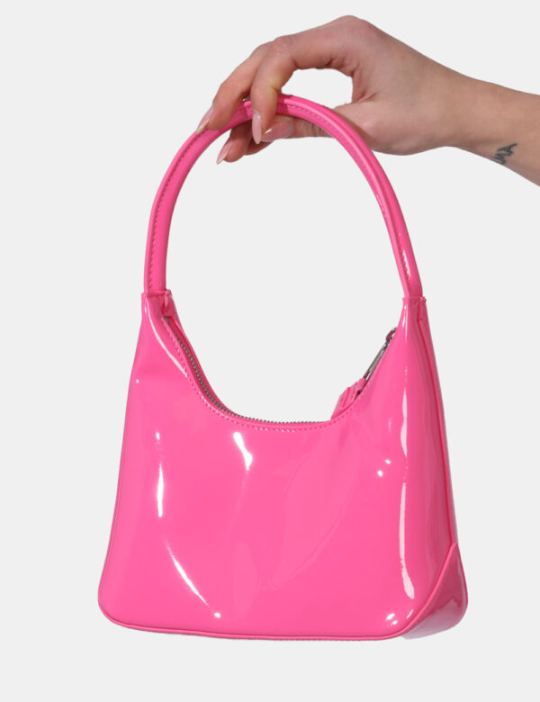 Borse Tommy Hilfiger Fucsia - Borsa a mano di piccole dimensioni in total fucsia in vernice con logo brand argentato. L'inte