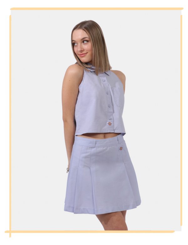 Top Dickies Lilla - Top simil camicia smanicata in total lilla. Presente colletto alla peter pan e taschino a toppa. La vest