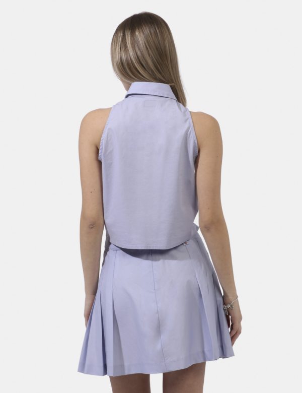 Top Dickies Lilla - Top simil camicia smanicata in total lilla. Presente colletto alla peter pan e taschino a toppa. La vest