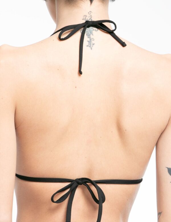 Bikini Guess top fantasia - 80% poliammide 20% elastinaLa modella indossa la taglia XS e la vestibilità del capo è regolareU