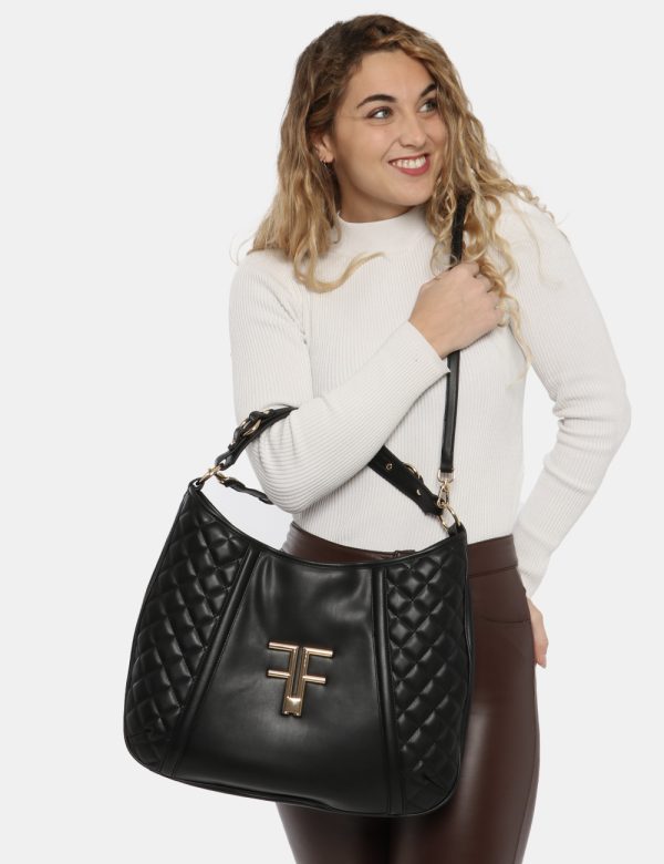 Borsa Fracomina nero - COMPOSIZIONE E VESTIBILITÀ:100% poliuretanoCONSIGLI DI STILE:Borsa a mano o spalla semirigida di gran