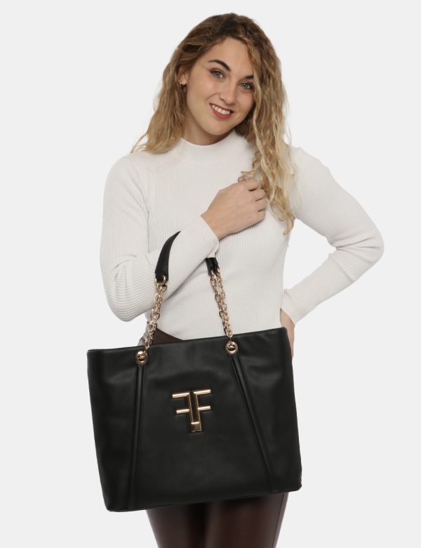 Borsa Fracomina nero - COMPOSIZIONE E VESTIBILITÀ:100% poliuretanoCONSIGLI DI STILE:Borsa a mano o spalla semirigida di gran