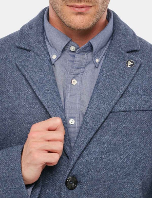 Cappotto Fred Mello con bottoni - 50% lana 40% poliestere 10% poliammideIl modello indossa la taglia L ed è alto 184 cm e la