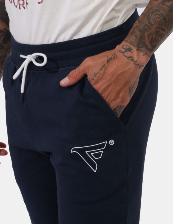 Pantaloni Fred Mello Blu - Pantaloni della tuta in total blu navy con logo brand bianco. Presenti polsini sul girocaviglia e