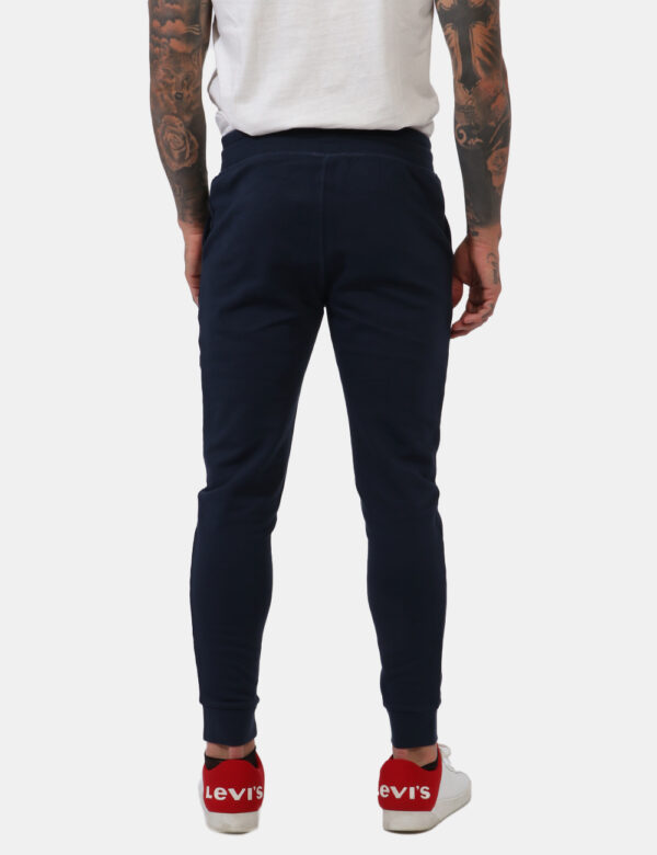 Pantaloni Fred Mello Blu - Pantaloni della tuta in total blu navy con logo brand bianco. Presenti polsini sul girocaviglia e