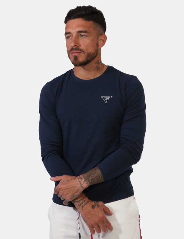 T-shirt Fred Mello Blu - T-shirt a maniche lunghe su in total blu navy con logo brand ricamato bianco ad altezza cuore. La v