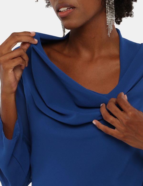 Camicia Vougue scollo morbido - 100% poliestereLa modella indossa la taglia S ed è alta 170 cm e la vestibilità è regolareUn