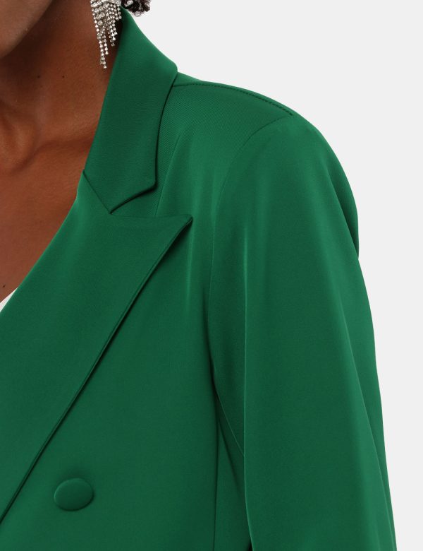 Blazer Vougue doppio petto - 90% poliestere 10% elastinaLa modella indossa la taglia S ed è alta 170 cm e la vestibilità è