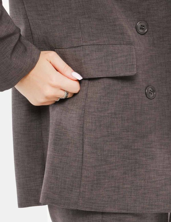 Blazer Vougue senza allacciatura - 100% poliestereLa modella indossa la taglia S ed è alta 168 cm e la vestibilità è regola