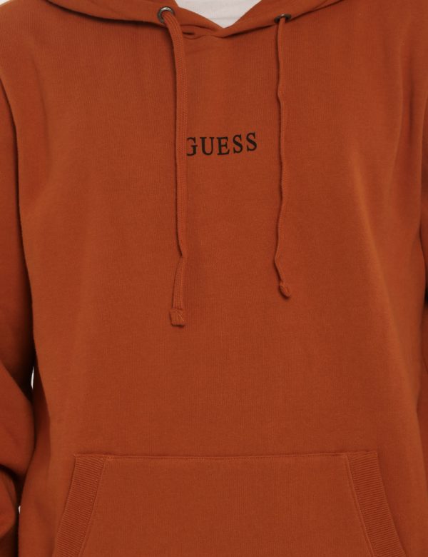 Felpa Guess marrone bruciato - COMPOSIZIONE E VESTIBILITÀ:88% cotone 12% poliestereIl modello è alto 175 cm e indossa la tag