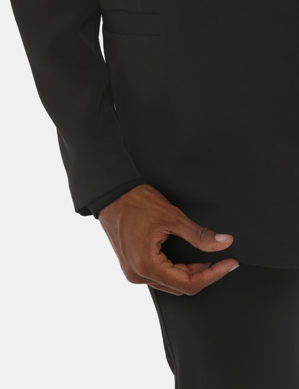 Blazer Vougue con tasche finte - 97% poliestere 3% elastinaLa modella indossa la taglia S e la vestibilità è regolare. Spal