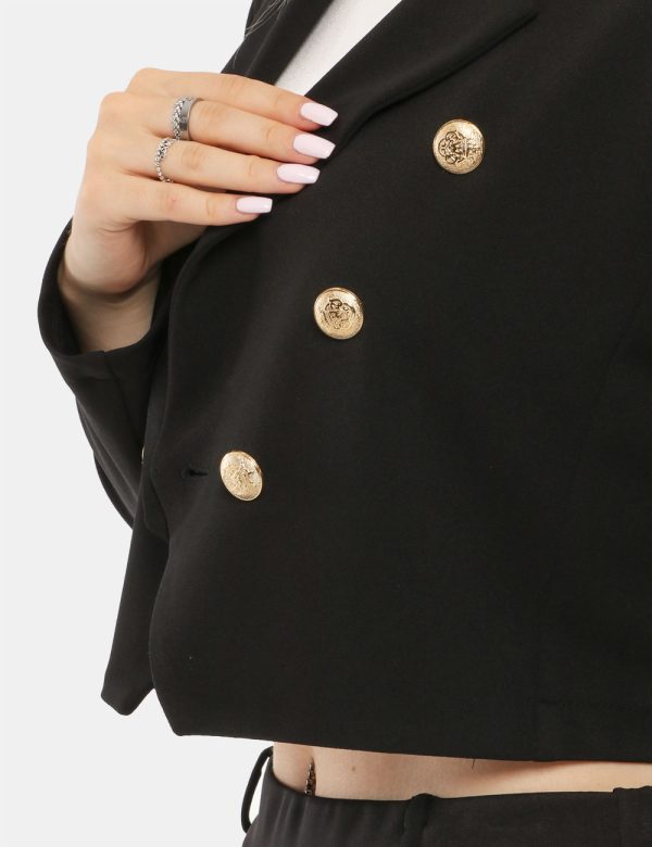 Blazer Vougue corto - 90% poliestere 10% elastinaLa modella indossa la taglia S ed è alta 168 cm e la vestibilità è regolar