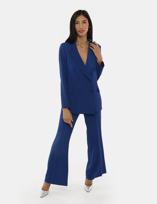 Pantalone Vougue in coordinato - 97% poliestere 3% elastanLa modella indossa la taglia S e la vestibilità del capo è regolar