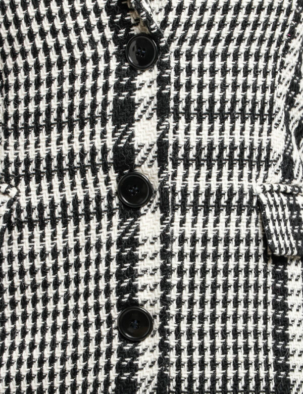 Cappotto Vougue con tasche finte - 20% lana 17% poliestere 58% acrilico 5% elastinaLa modella indossa la taglia S ed è alta