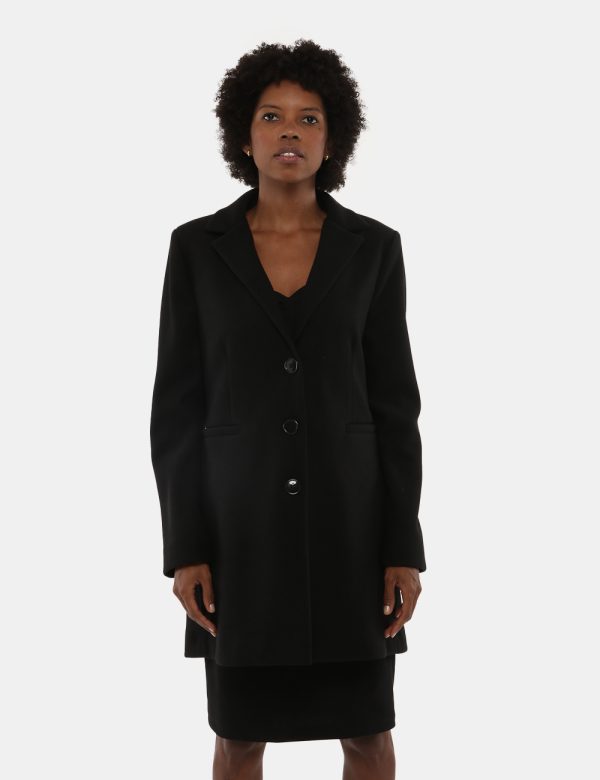 Cappotto Vougue con bottoni - 100% poliestereLa modella indossa la taglia S e la vestibilità è regolare. Spalle: 37 cm - Lun