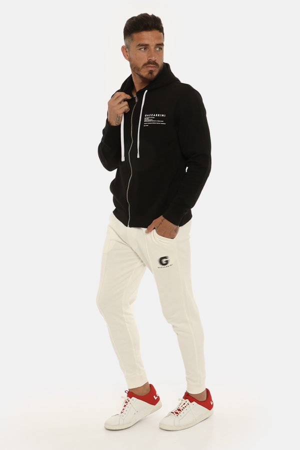 Pantalone Gazzarrini bianco panna - COMPOSIZIONE E VESTIBILITÀ:100% cotoneIl modello è alto 178 cm e indossa la taglia L. La