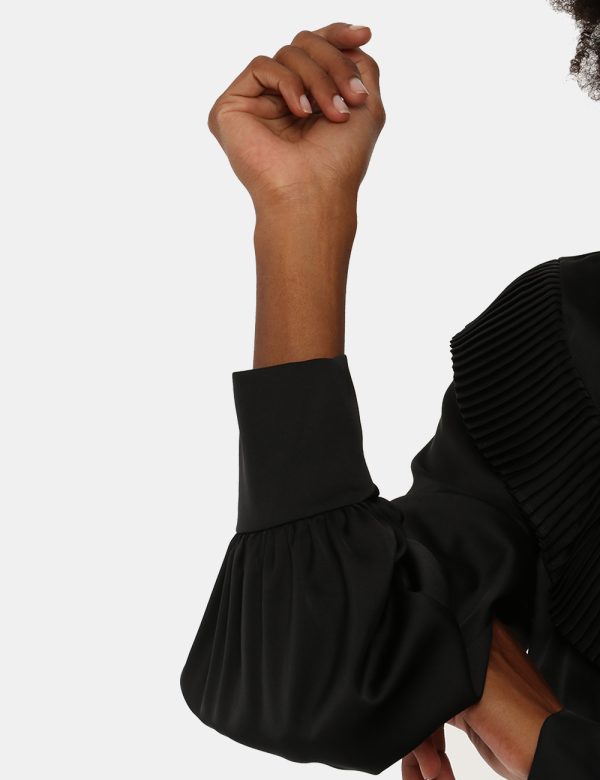 Camicia Sandro Ferrone con plissé - 97% poliestere 3% elastinaLa modella indossa la taglia S ed è alta 170 cm e la vestibili