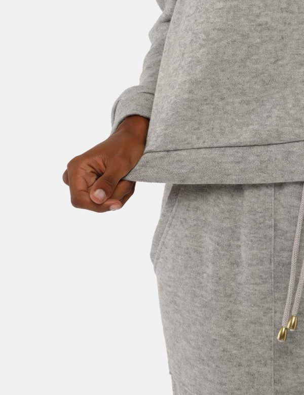 Maglione Sandro Ferrone con spalla arricciata - 95% poliestere 5% elastinaLa modella indossa la taglia S ed è alta 170 cm e