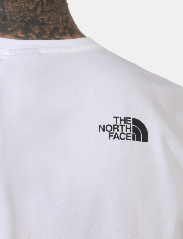 T-shirt The North Face Bianco - T-shirt su base bianca con piccola stampa logo brand sia sul fronte sia sul retro in nero. L
