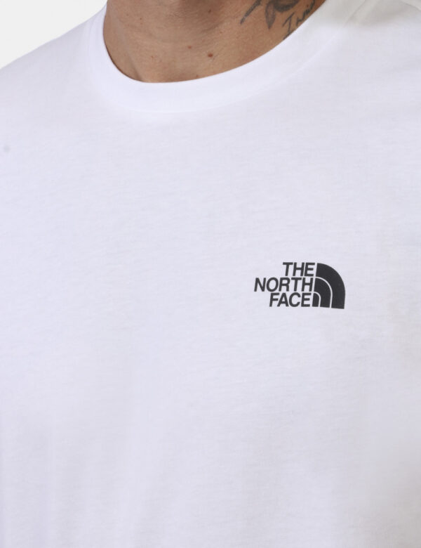 T-shirt The North Face Bianco - T-shirt su base bianca con piccola stampa logo brand sia sul fronte sia sul retro in nero. L