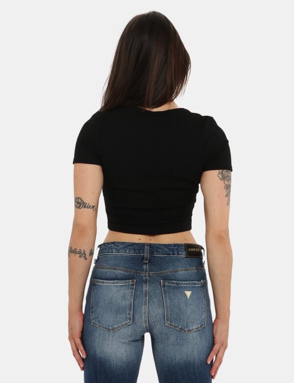 Maglia Guess - 74% poliestere 22% rayon 4% spandexLa modella è alta 165 cm e indossa la taglia S. La vestibilità del capo è