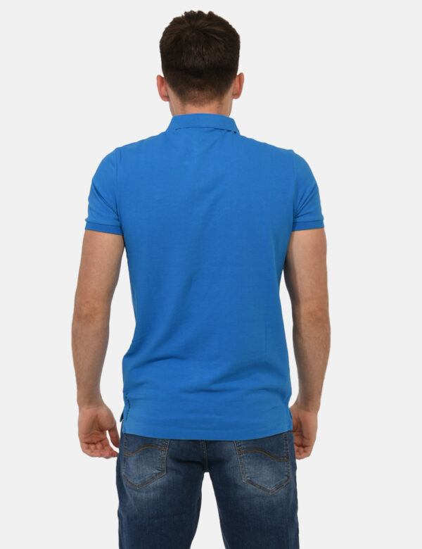 Polo U.S. Polo Assn. Blu - Polo classica in total blu con patch logo brand ricamato in nero ad altezza cuore. La vestibilità