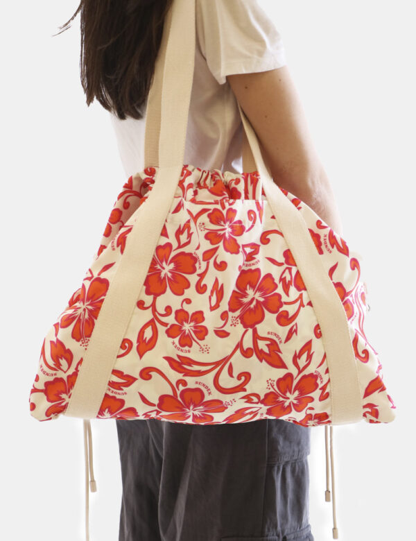 Borsa Sundek Arancione - Borsa mare in tessuto su base bianca con stampa allover floreale arancione e rosa. L'interno è capi