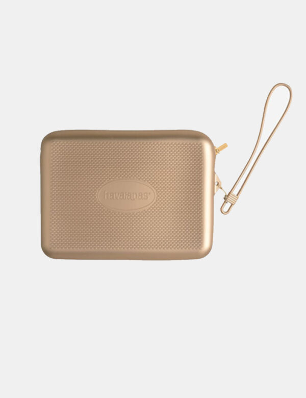 Pochette mare Havaianas Oro - Pochette da mare in total gomma ed in tinta oro. Presente unico scompartimento con chiusura a