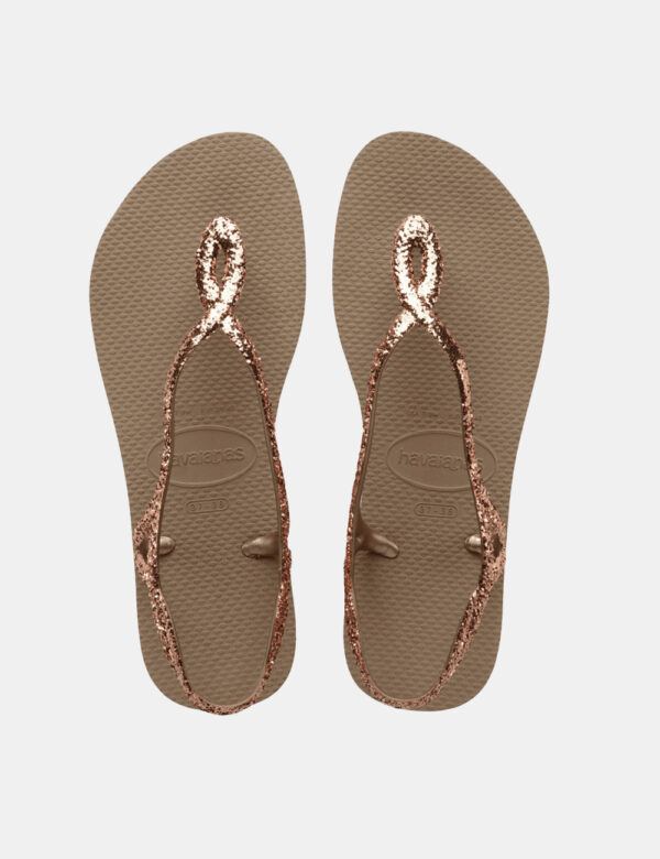 Infradito Havaianas Marrone - Ciabatte modello infradito in total marrone con stringa a Y glitterata. La calzata è comoda e