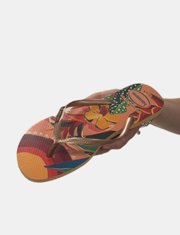 Infradito Havaianas Fantasia - Ciabatte modello infradito su base tropicale tendente all'arancione pesca e stringa a Y in br