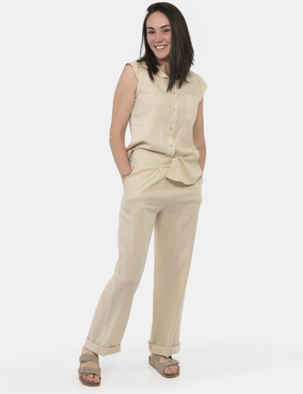 Pantaloni Rue De Clerie Beige - Pantaloni larghi in total beige con tasche a taglio trasversale. La vestibilità è morbida e