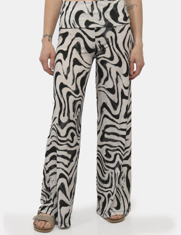 Pantaloni Rue De Clerie Nero - Pantaloni eleganti e larghi su base beige con fantasia nera. La vestibilità è pratica e regol