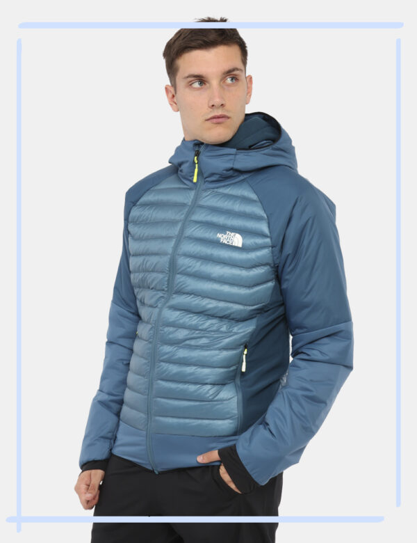 Piumino The North Face Blu - Piumino 100 grammi con cappuccio e tasche. Indossalo per le tue passeggiate outdoor o in città