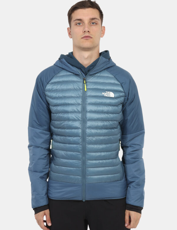 Piumino The North Face Blu - Piumino 100 grammi con cappuccio e tasche. Indossalo per le tue passeggiate outdoor o in città