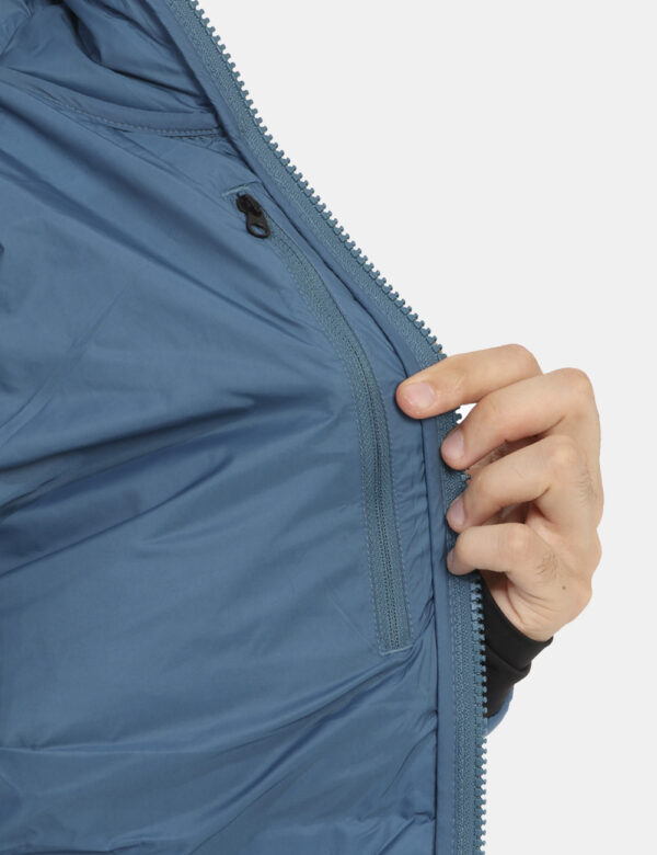 Piumino The North Face Blu - Piumino 100 grammi con cappuccio e tasche. Indossalo per le tue passeggiate outdoor o in città