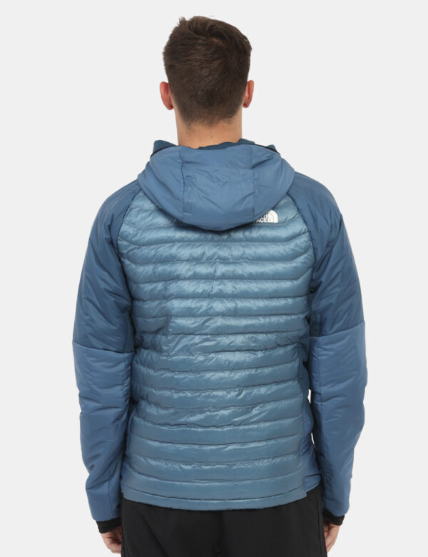Piumino The North Face Blu - Piumino 100 grammi con cappuccio e tasche. Indossalo per le tue passeggiate outdoor o in città