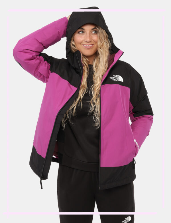 Piumino The North Face Fucsia - Piumino iconico The North Face bicolore esternamente, fucsia e nero, e internamente bordeaux