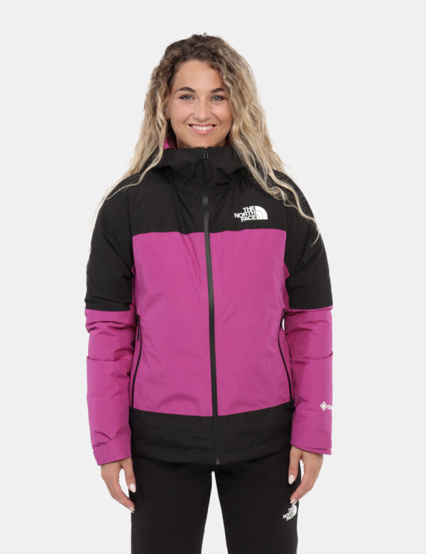 Piumino The North Face Fucsia - Piumino iconico The North Face bicolore esternamente, fucsia e nero, e internamente bordeaux