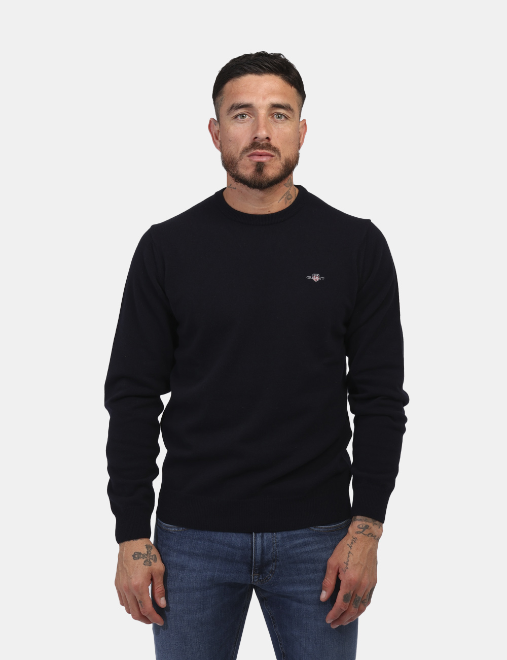 87211-SV_EVENING-BLUE_AI24_5 Maglione Gant Blu - Maglione con girocollo classico in total blu navy con piccolo logo ad altezza cuore. La vestibilità è mo