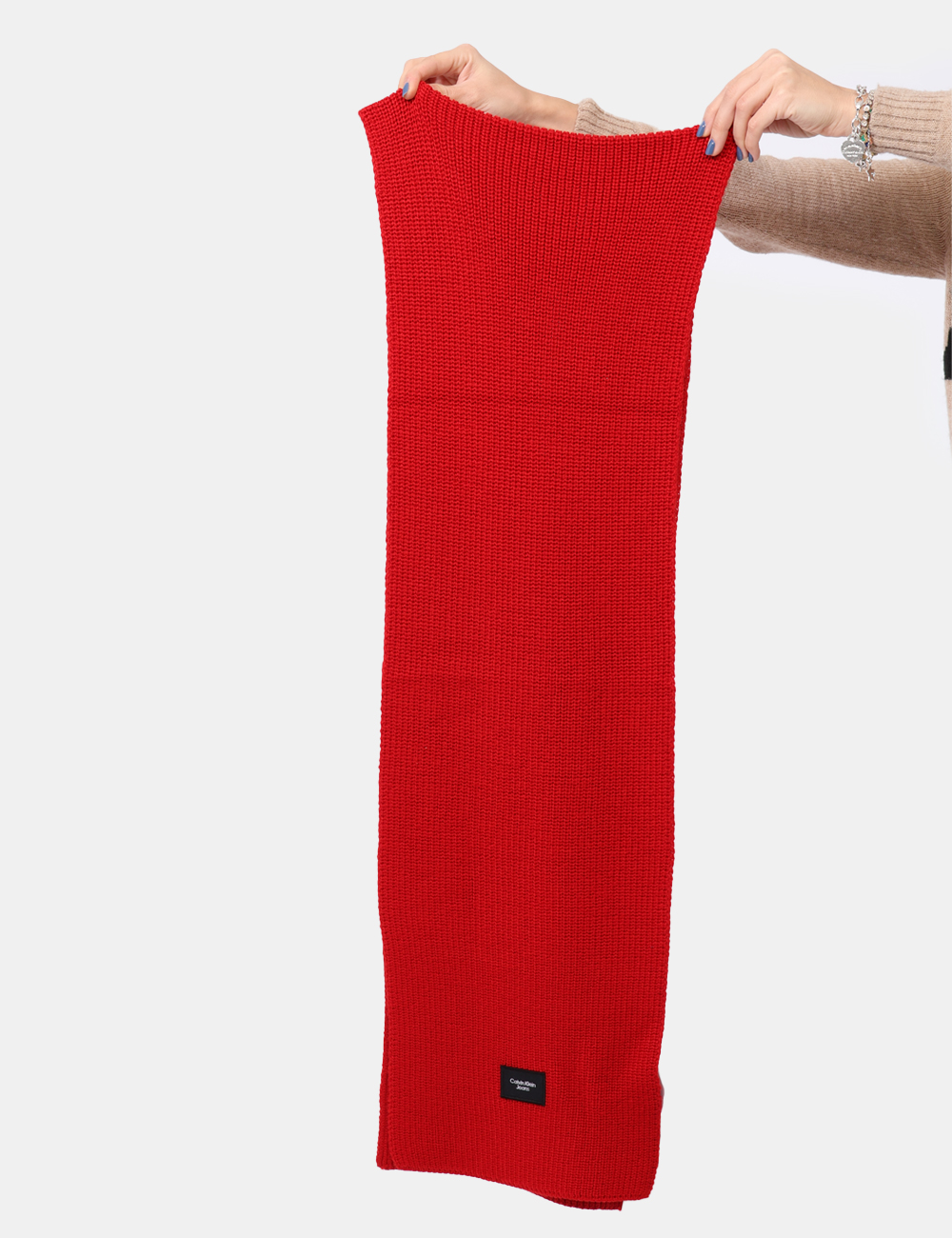 ZW0ZW02235-SV_GV7_AI24_1 Sciarpa Calvin Klein Rosso - Sciarpa in misto lana ed in total rosso con patch logo brand . L'indossatura è pratica e manegg