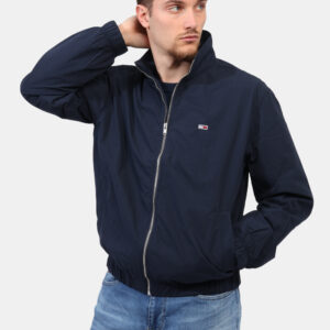 Giubbino Tommy Hilfiger Blu - Giacca impermeabile in total blu navy con tasche a taglio trasversale e chiusura a bottone. La
