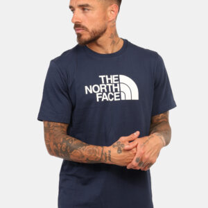 T-shirt The North Face Blu - T-shirt classica su base blu navy con stampa logo brand coordinata. La vestibilità è morbida e