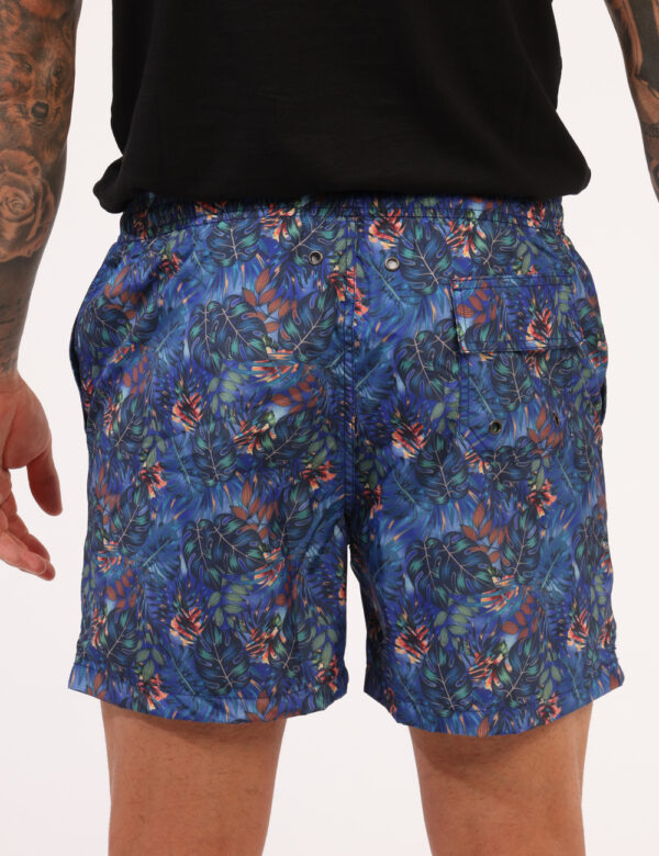 Costume Goha Blu - Costume modello boxer su base blu con stampa allover floreale in tinta coordinata. Presenti tasche a tagl