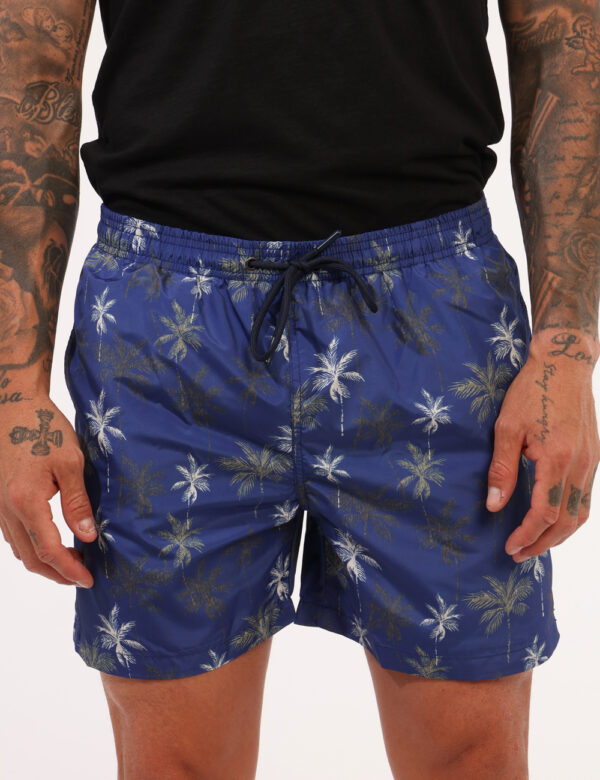 Costume Goha Blu - Costume modello boxer su base blu con stampa allover bianca e dorata. Presenti tasche a taglio trasversal