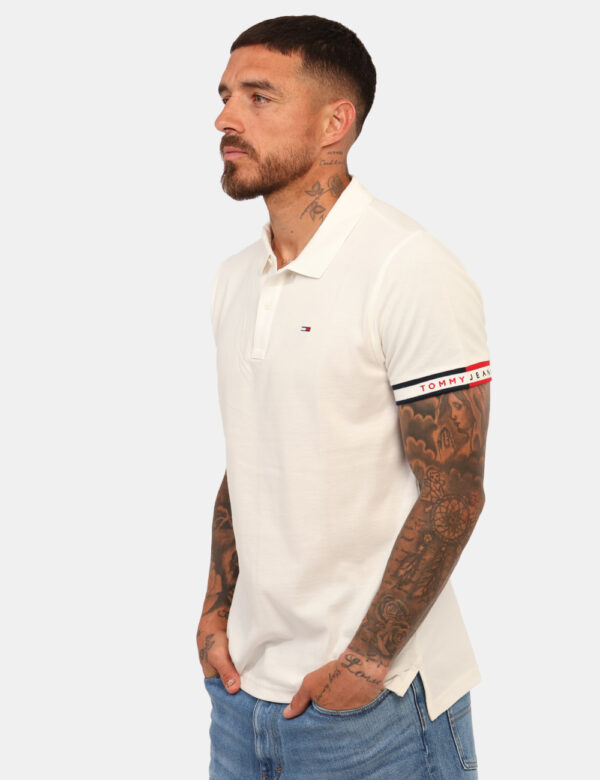 Polo Tommy Hilfiger Bianco - Polo classica in total bianco con logo ricamato ad altezza cuore in blu e rosso richiamato nel