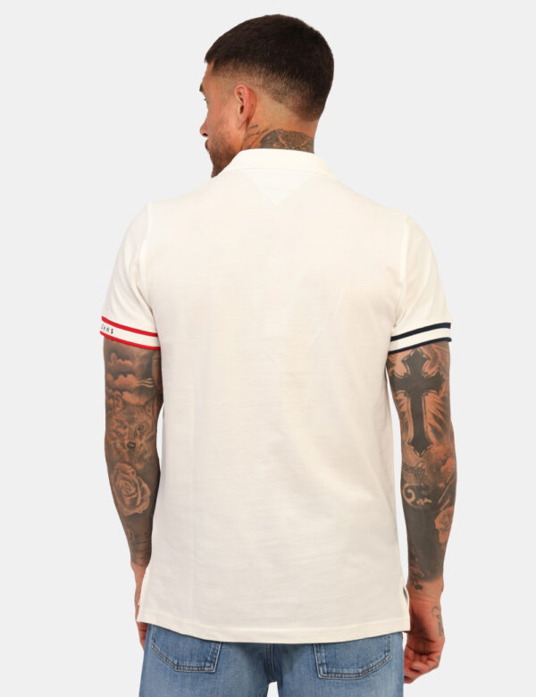Polo Tommy Hilfiger Bianco - Polo classica in total bianco con logo ricamato ad altezza cuore in blu e rosso richiamato nel
