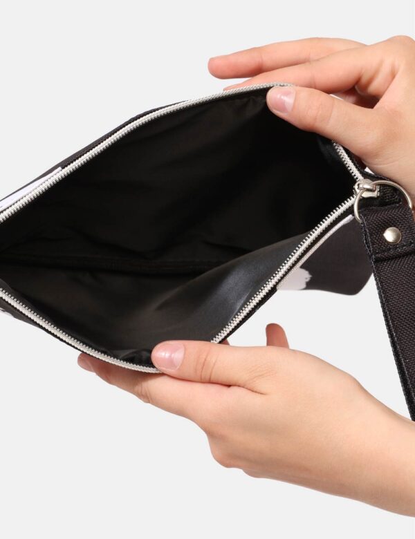 Pochette mare F**K Nero - Pochette mare su base nera con stampa pois bianchi. Chiusura affidata a zip e manico morbido per u