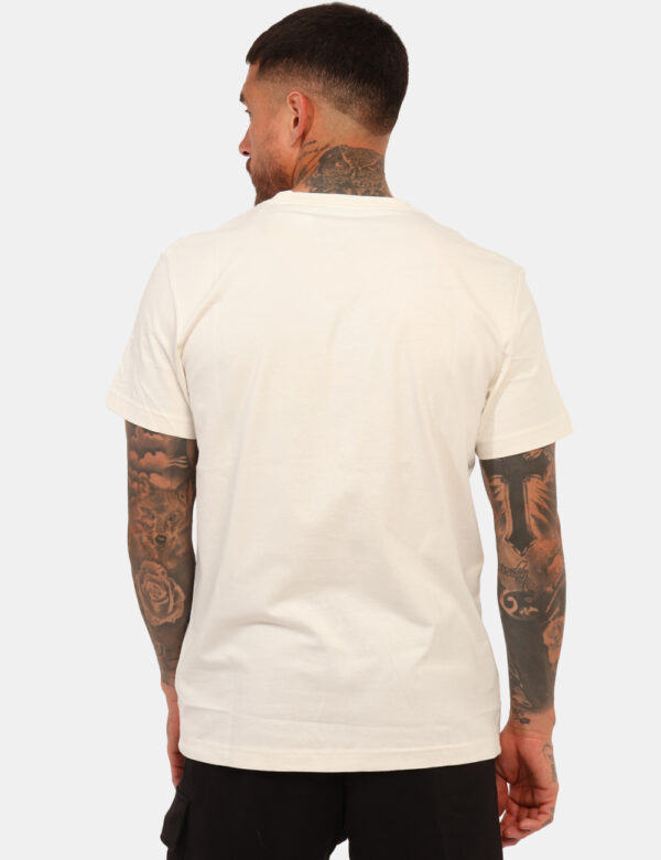 T-shirt Calvin Klein Beige - T-shirt classica su base beige con stampa logo brand coordinata. La vestibilità è morbida e reg