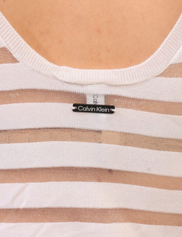 Copricostume Calvin Klein Bianco - Copricostume leggero, lungo, semitrasparente ed in total bianco. Presenti spalline strett