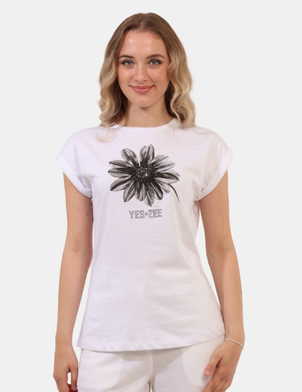 T-shirt Yes Zee Bianco - T-shirt classica su base bianca con stampa floreale glitterata. La vestibilità è morbida e regolare